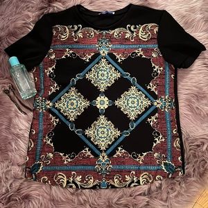 Zara black top with gold and teal design, hints of red/orange